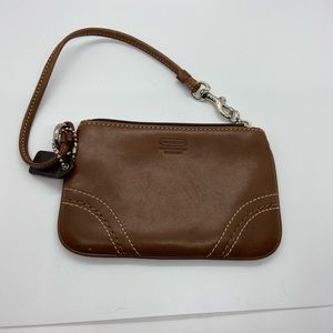 Brown leather Coach wristlet